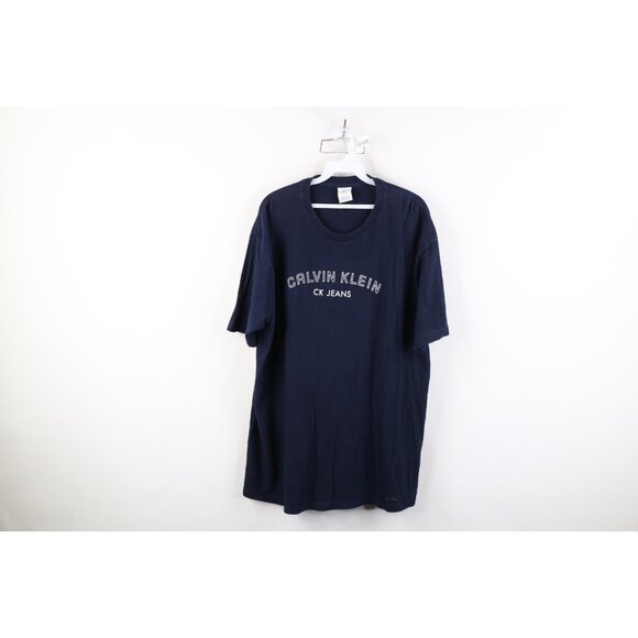 Vintage 90s Calvin Klein Mens Large Faded Spell Out Short Sleeve T-Shirt Blue - Picture 1 of 14